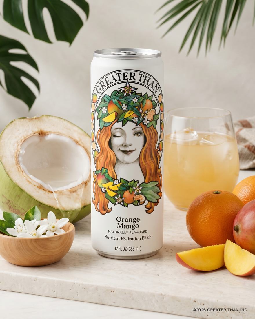 GREATER THAN Orange Mango can with fresh coconut, orange, and mango